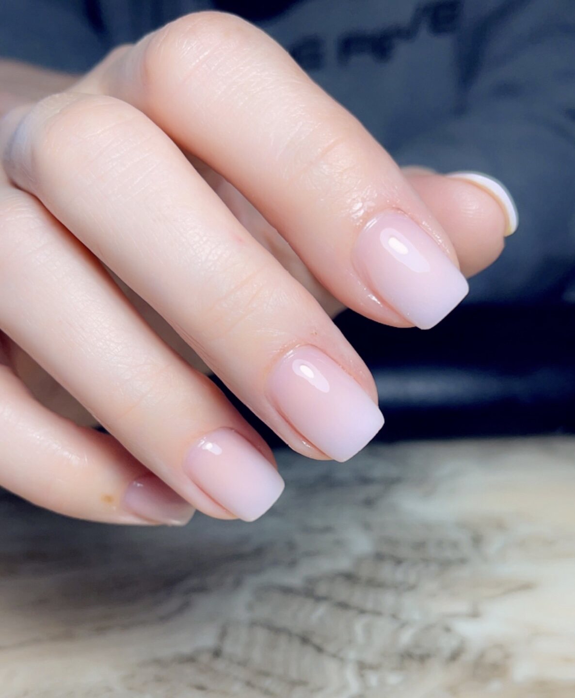 Soft pink ombré manicure by Vivid Nails & Spa