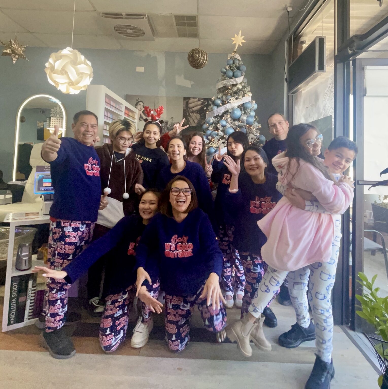 The Vivid Nails & Spa team together inside the Havelock salon